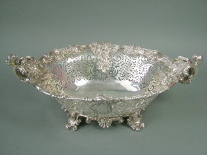 Appraisal: An impressive Victorian silver twin handled basket by 'John Bodman