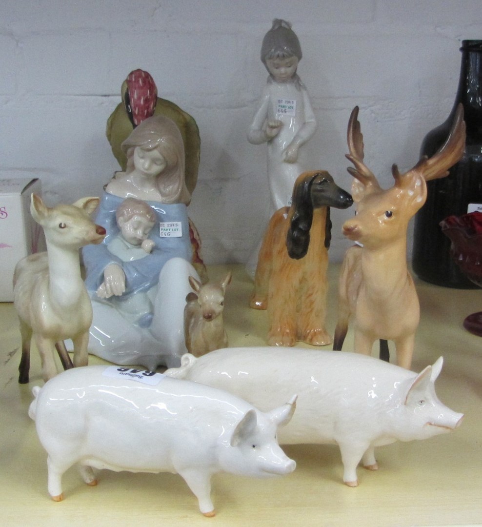 Appraisal: A Beswick woodpecker number a Beswick stag deer and fawn