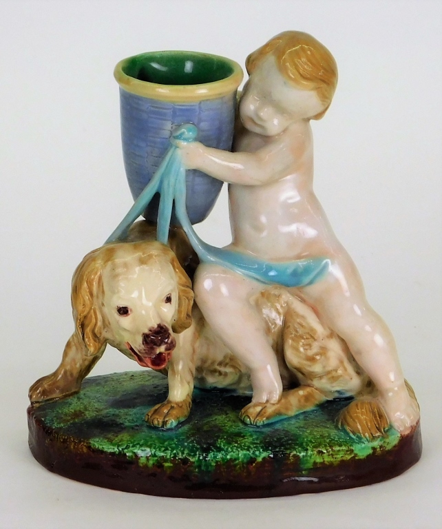 Appraisal: ATTR ROYAL DOULTON MAJOLICA FIGURAL BUD VASE England Late th-