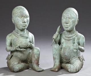 Appraisal: Pair of African Patinated Bronze Figures th c of a