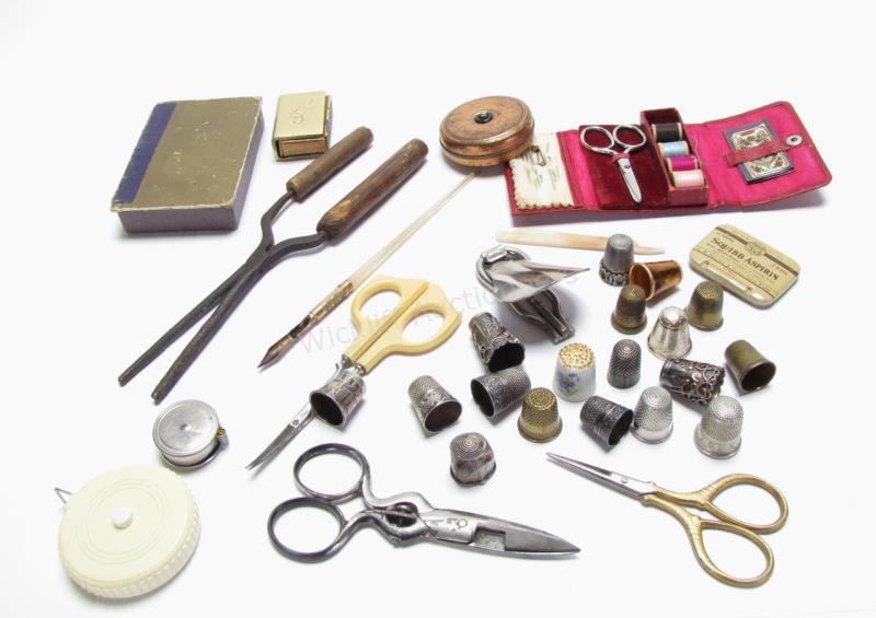 Appraisal: A group of sewing accessories including and thimble sterling sterling