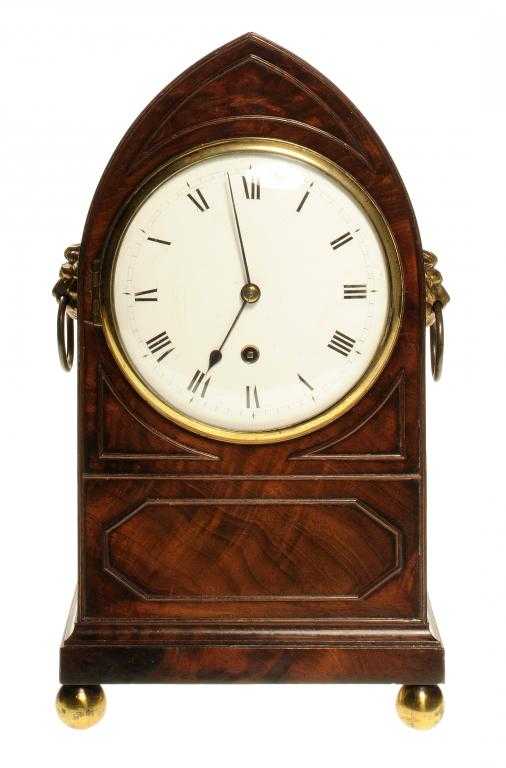 Appraisal: A REGENCY MAHOGANY TIMEPIECE the enamel dial with roman chapters