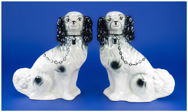 Appraisal: Pair of Staffordshire Black and White Spaniels