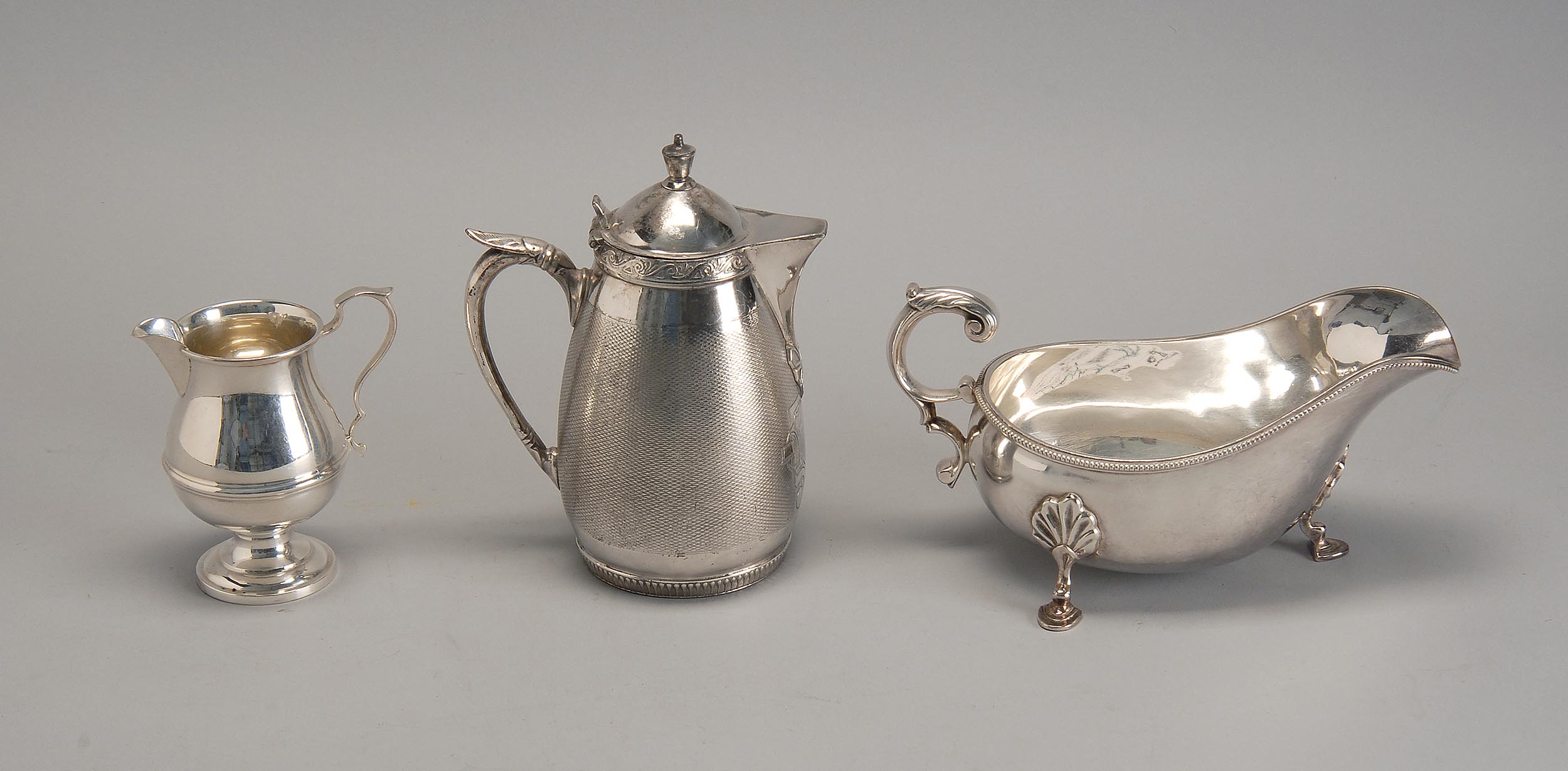 Appraisal: THREE PIECES OF STERLING SILVER AND SILVER PLATED HOLLOWWARE by