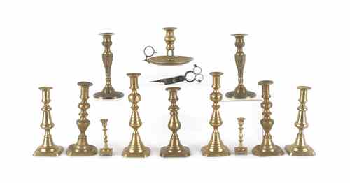 Appraisal: Collection of brass candlesticks th c together with a snuffer