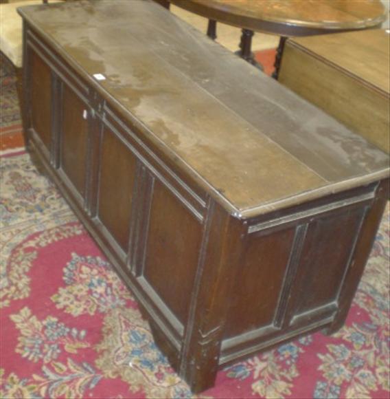 Appraisal: An oak coffer of panelled construction