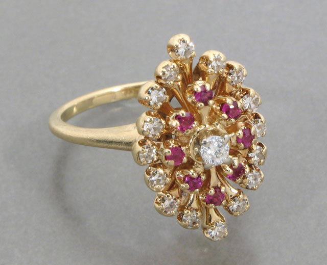 Appraisal: DIAMOND RUBY AND FOURTEEN KARAT GOLD CLUSTER RING the marquise-shaped