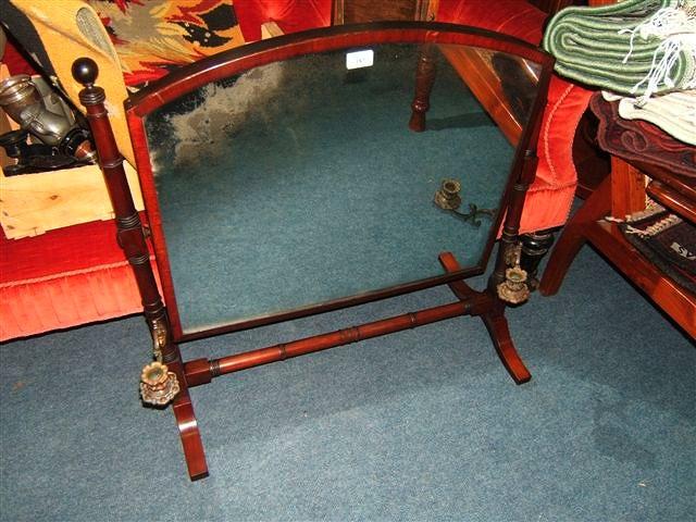 Appraisal: An early Victorian dressing table mirror with ring turned supports