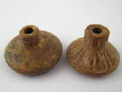 Appraisal: Two finely decorated spindle whorls from the South American Quimbaya