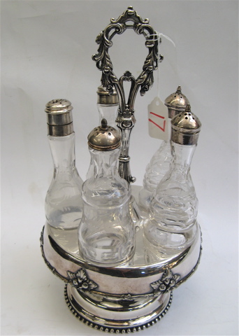 Appraisal: AN AMERICAN SILVER PLATED CASTOR SET having etched glass bottles