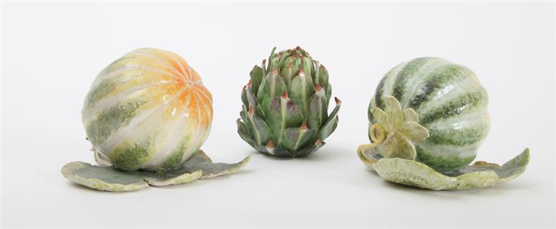 Appraisal: PAIR OF PORCELAIN MELONS AND AN ARTICHOKE MODELED BY ANN