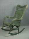 Appraisal: ROCKING CHAIR - CIRCA WICKER ROCKING CHAIR WITH CONTINUOUS ROLLED