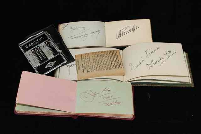 Appraisal: AN EXACTUS MINI-ADD CALCULATOR together with three autograph books containing