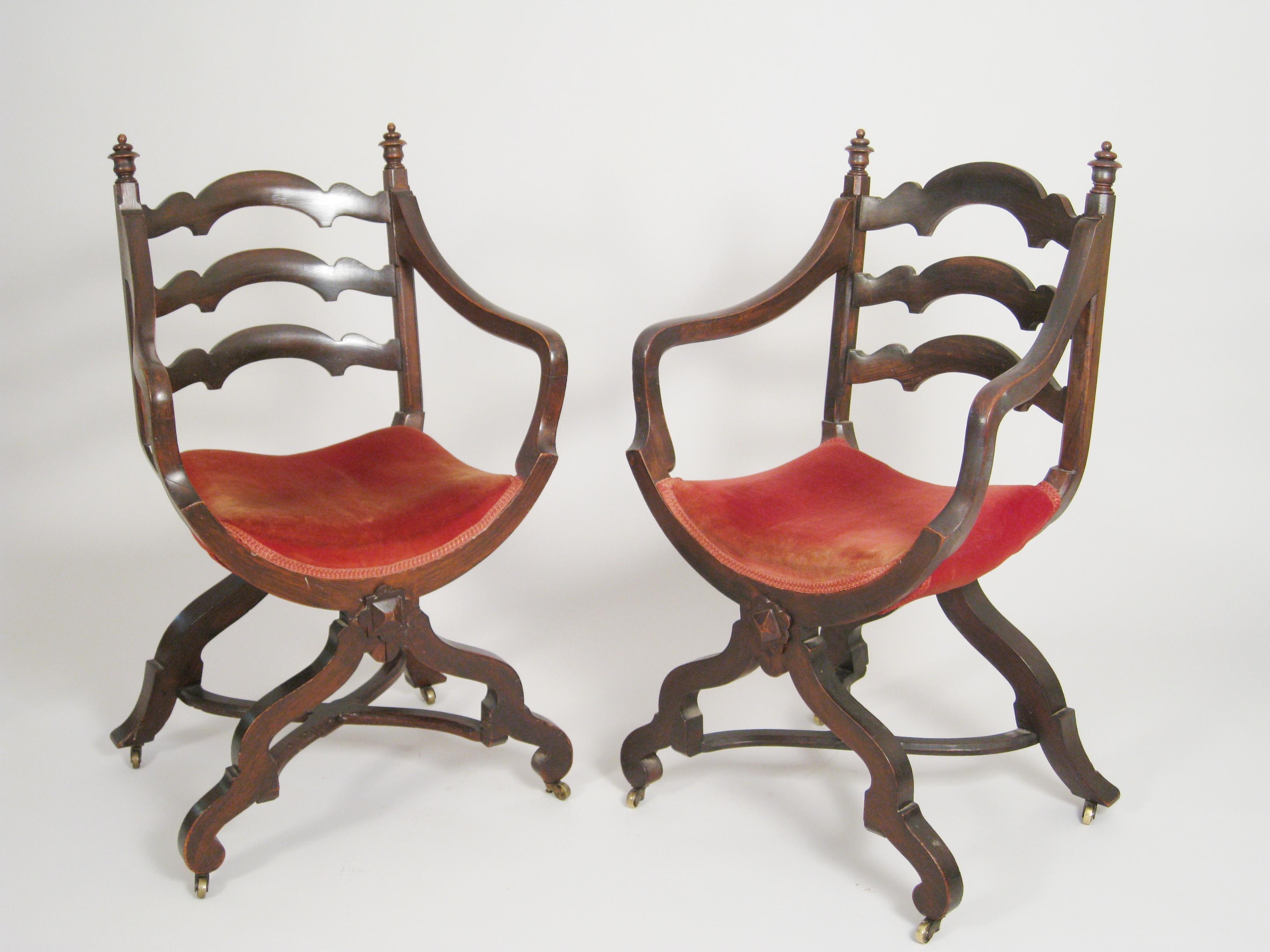 Appraisal: Pair of th Century Italiante simulated rosewood Elbow Chairs with