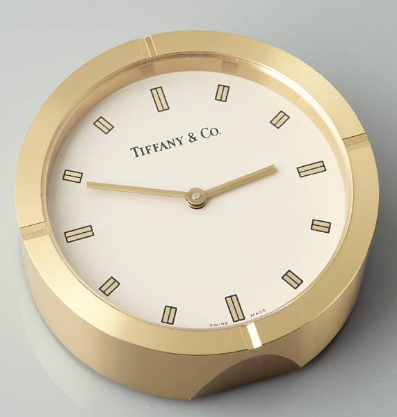 Appraisal: A brass desk alarm clock with box and pouch Tiffany