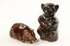 Appraisal: STONEWARE FIGURES - th c Piggy Bank and Standing Bear