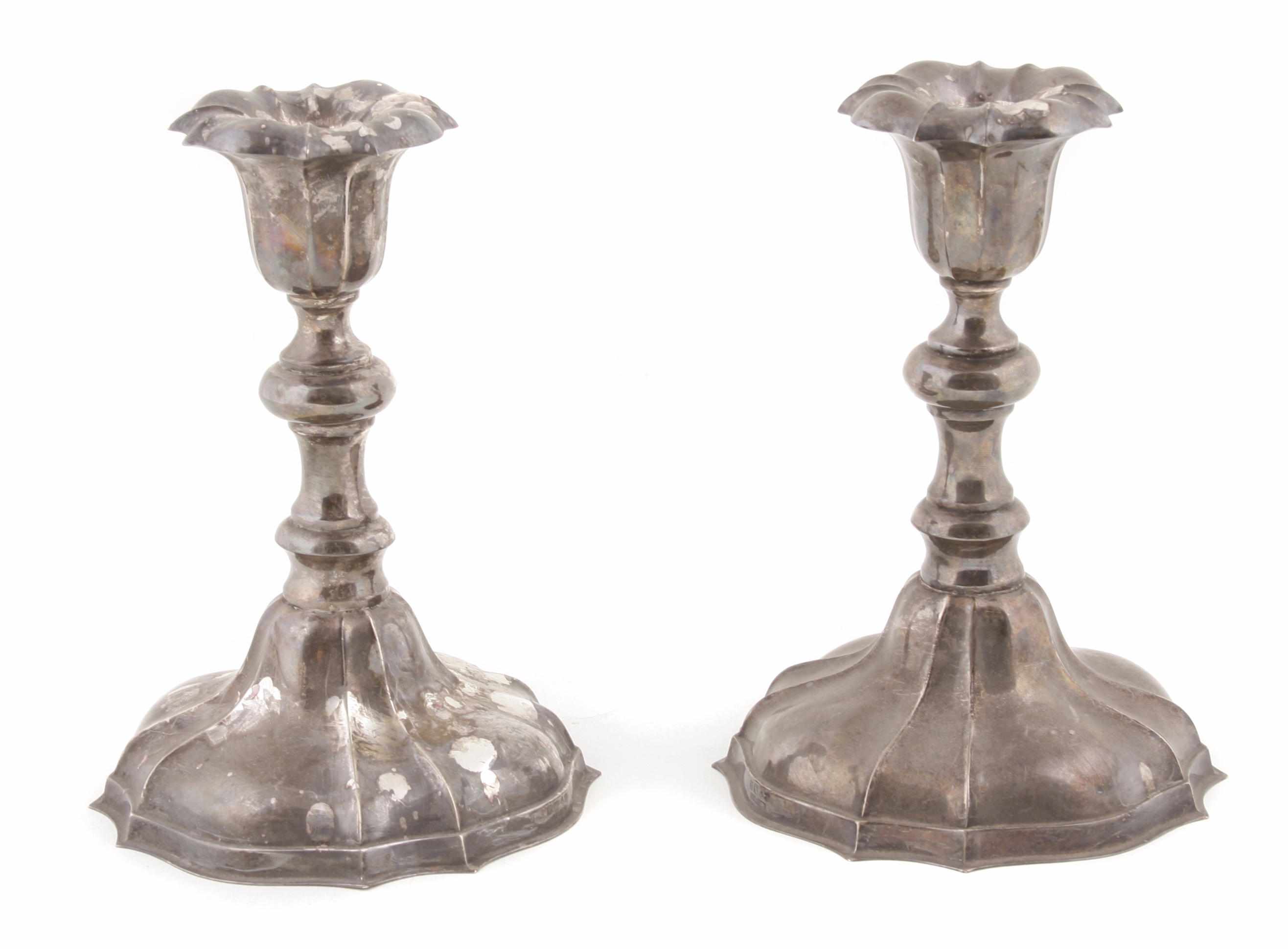 Appraisal: A set of four sterling silver candlesticks Probably American or