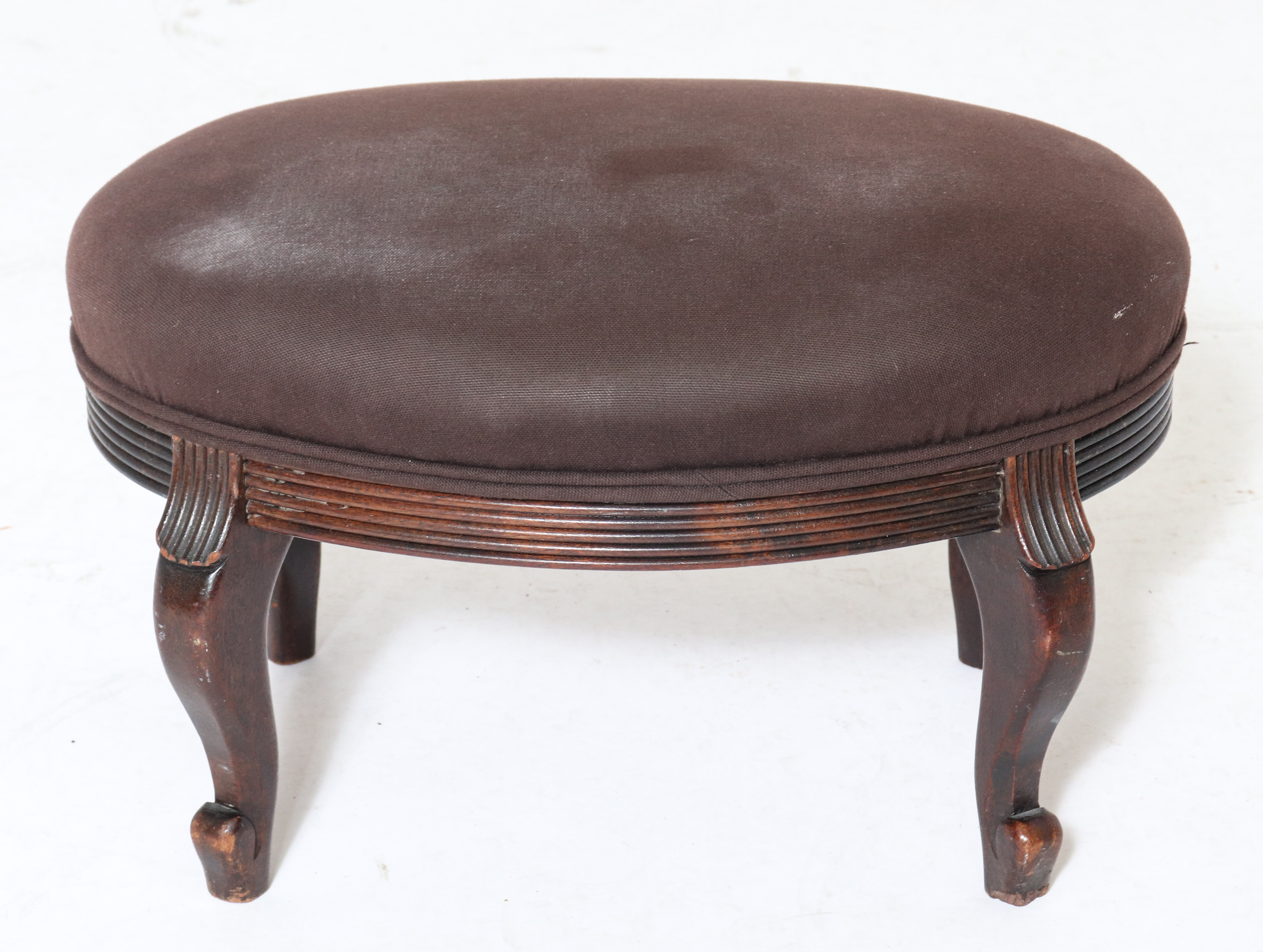 Appraisal: VICTORIAN UPHOLSTERED DIMINUTIVE OVAL FOOTSTOOL Victorian upholstered diminutive oval footstool