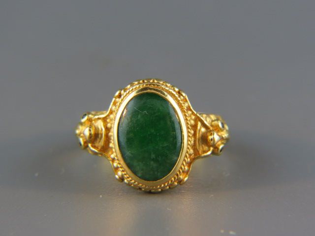 Appraisal: K Jade Ring Chinese oval stone superb green signed grams