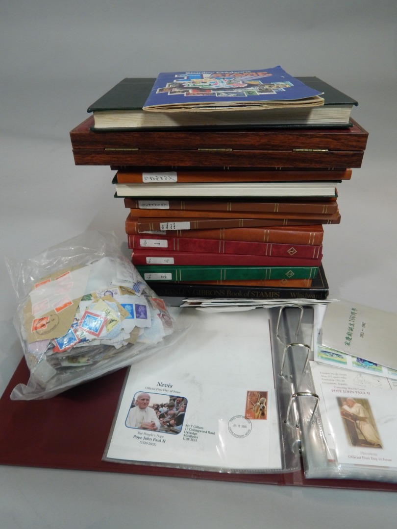 Appraisal: A large quantity of stock books containing stamps some loose