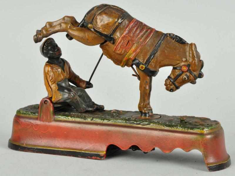 Appraisal: Cast Iron Always Did Spise A Mule Mechanical Bank Description