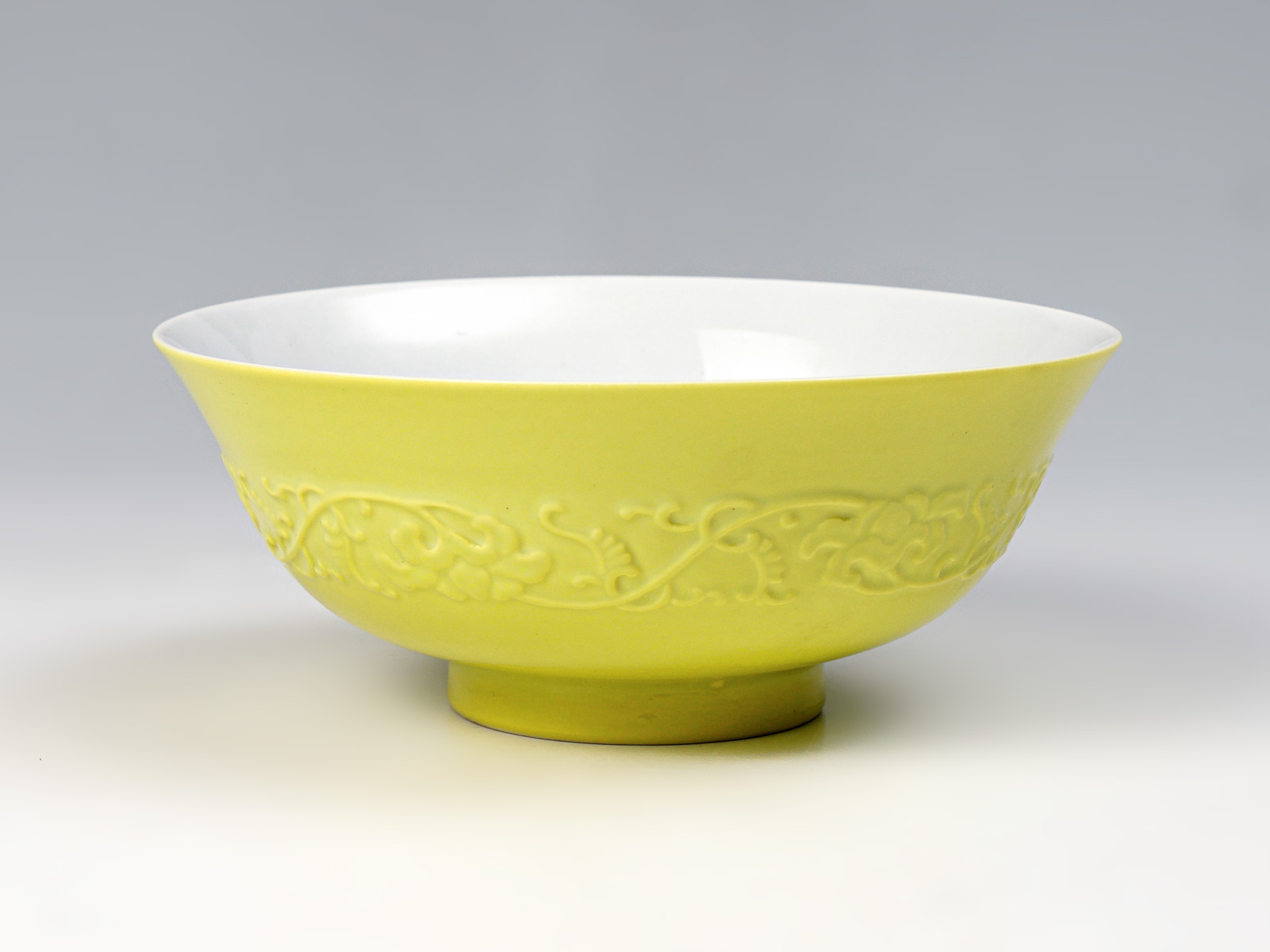 Appraisal: IMPERIAL YELLOW CHINESE PORCELAIN BOWL Having an orange peel Yellowish