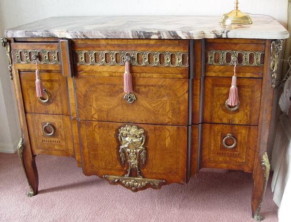 Appraisal: TURN OF THE CENTURY FRENCH BLOCK FRONT CHEST Swirled and