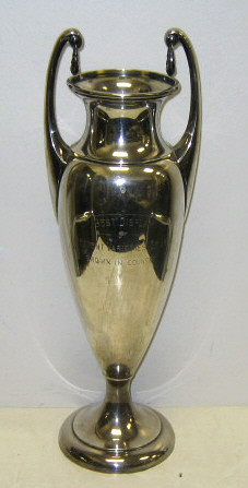 Appraisal: DOMINICK HAFF NEW YORK Sterling silver trophy urn footed ovoid