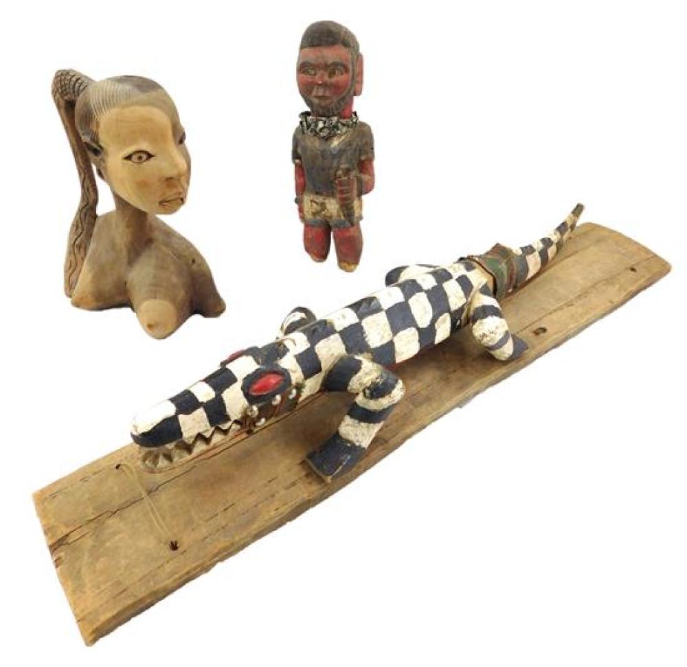 Appraisal: TRIBAL Three African carved wood items made for the tourist