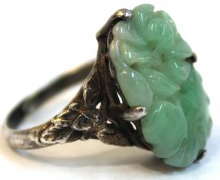 Appraisal: Silver Carved Jadeite Vintage Ring An oval plaque of carved