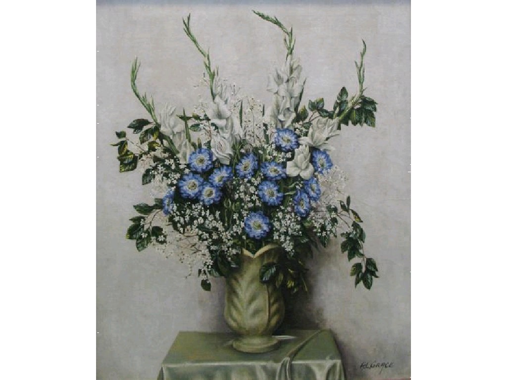 Appraisal: A L GRACE A still life of cornflowers and hollyhocks