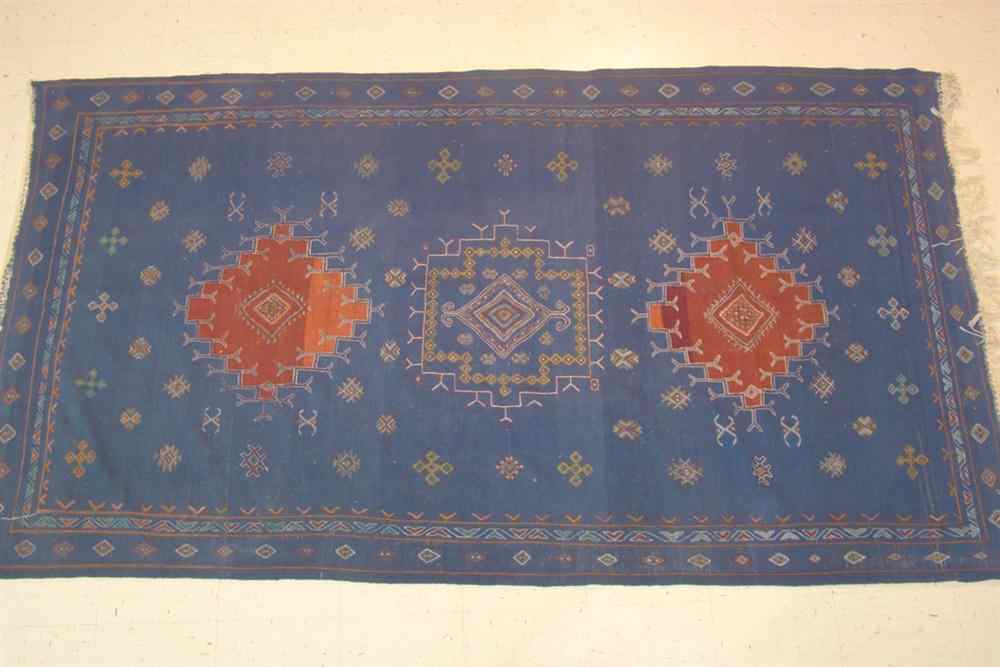 Appraisal: BLUE DHURRIE RED CENTRAL MEDALLION wool and cotton approx '