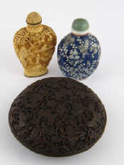 Appraisal: Two Chinese snuff bottles one ceramic with blue overlay and