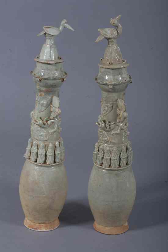 Appraisal: PAIR CHINESE QINGBAI FUNERARY URNS AND COVERS Yuan Dynasty Molded