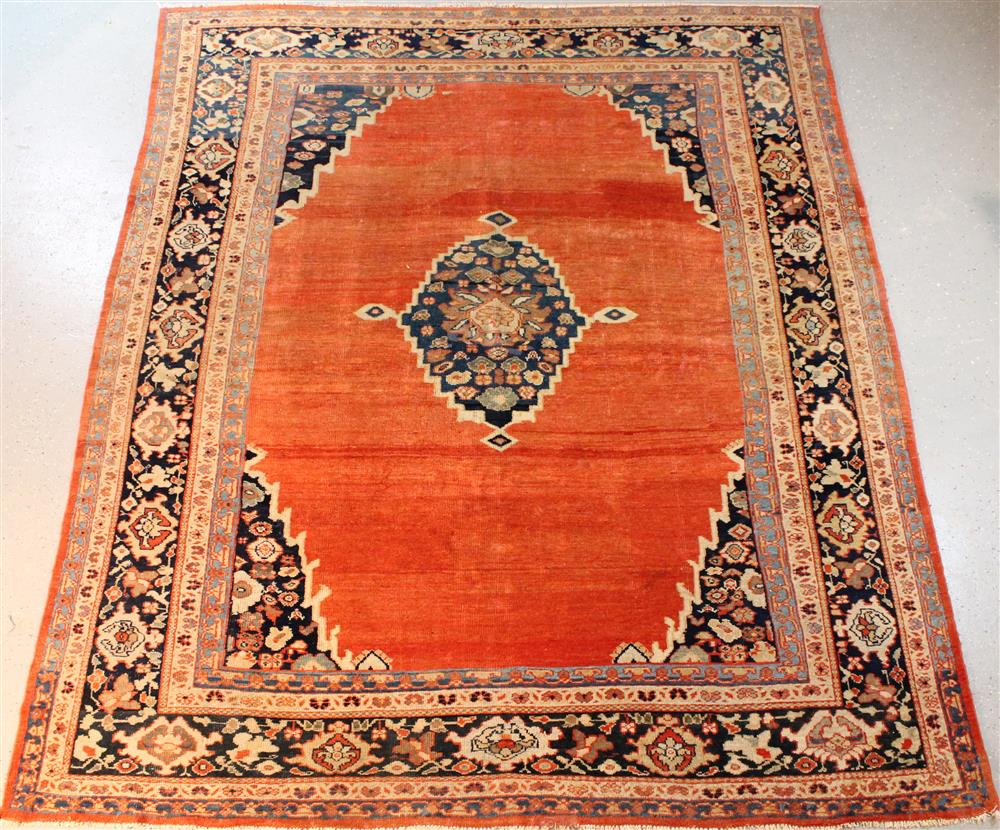 Appraisal: PERSIAN SULTANABAD RUG CIRCA border of radiating floral motifs encloses