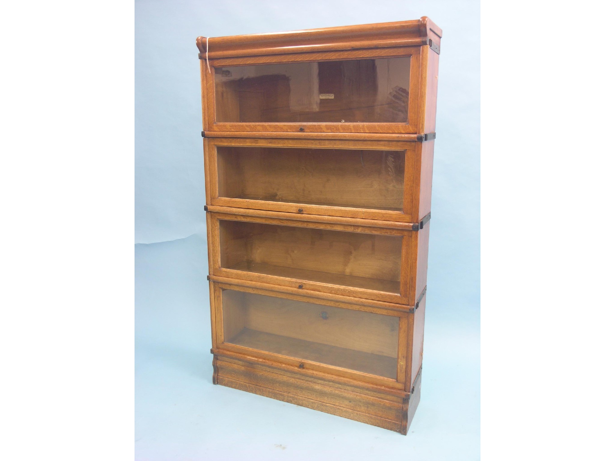 Appraisal: A Globe Wernicke medium oak bookcase four glazed sections ft