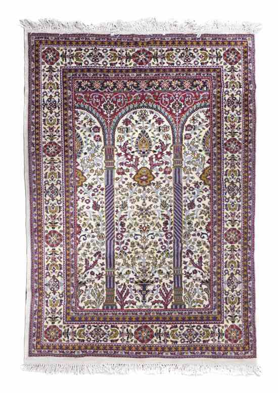 Appraisal: A Persian Wool Prayer Rug decorated with an urn issuing