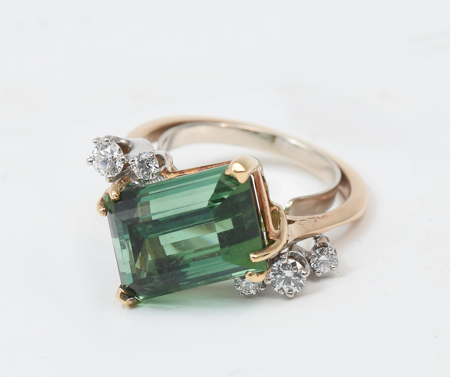 Appraisal: K TOURMALINE DIAMOND RING K yellow gold ring contains one