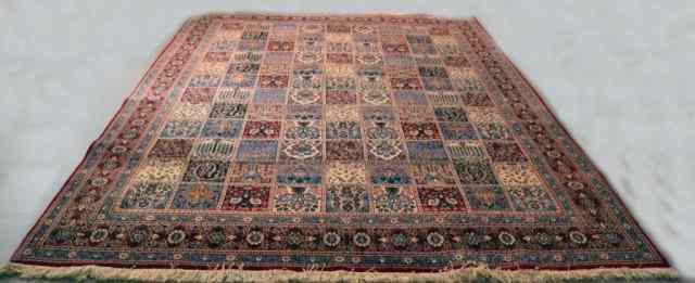 Appraisal: A FINE HAND-MADE WOOL PERSIAN CARPETRed field with unusual design