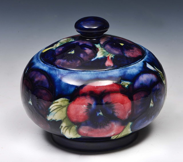 Appraisal: William Moorcroft British - Pansy jar and cover with WM