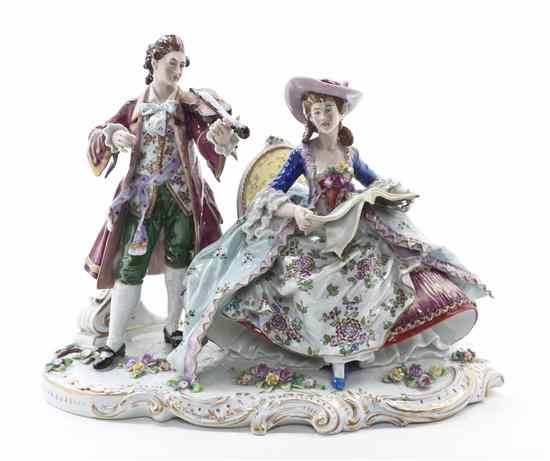 Appraisal: A Sitzendorf Porcelain Figural Group depicting a gentleman and a