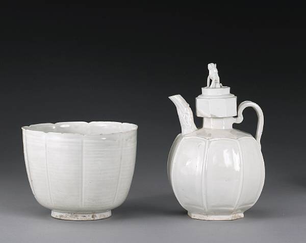 Appraisal: A fine molded Dingyao ewer and basin Song Dynasty The