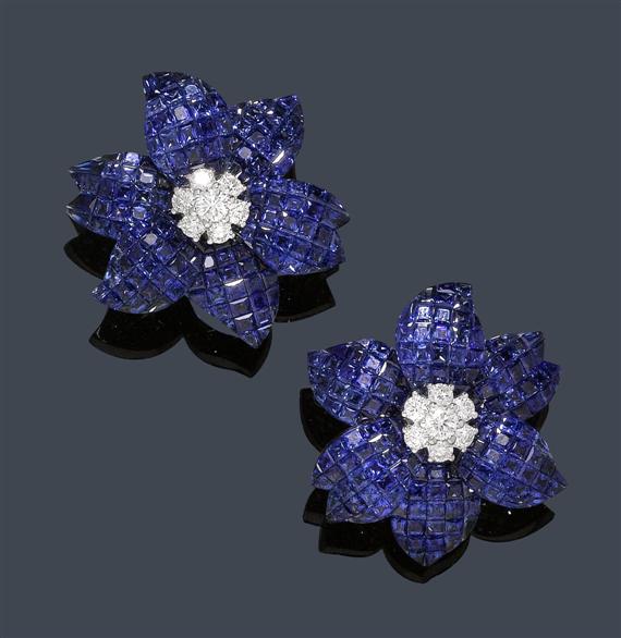 Appraisal: SAPPHIRE AND DIAMOND EAR CLIPS White gold Decorative elegant flower-shaped