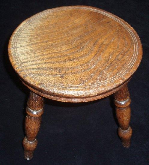 Appraisal: A th Century elm stool the circular seat on four