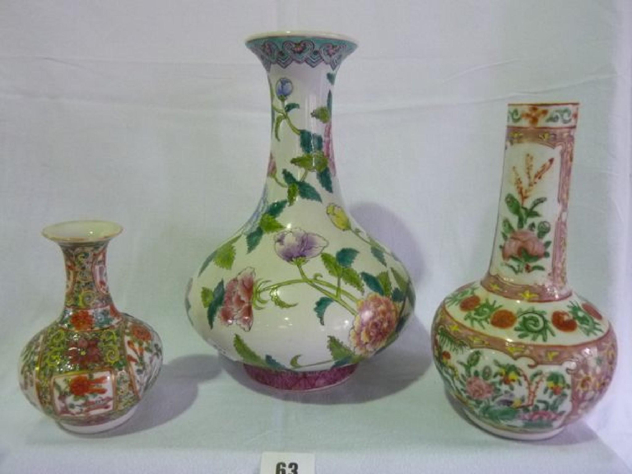 Appraisal: A Chinese bottle vase with flared neck decorated with flowers