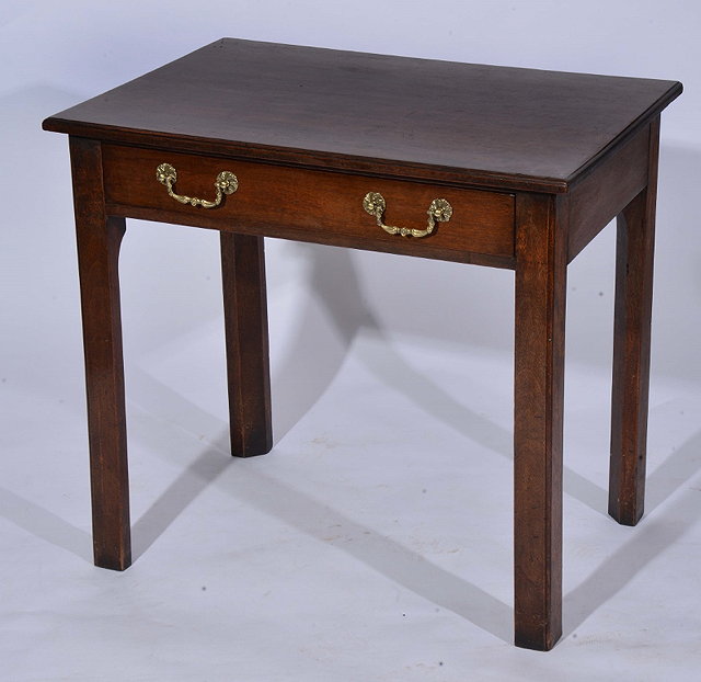 Appraisal: A TH CENTURY MAHOGANY RECTANGULAR SIDE TABLE fitted one long