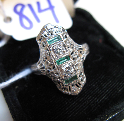 Appraisal: EMERALD DIAMOND AND EIGHTEEN KARAT WHITE GOLD RING The pierced