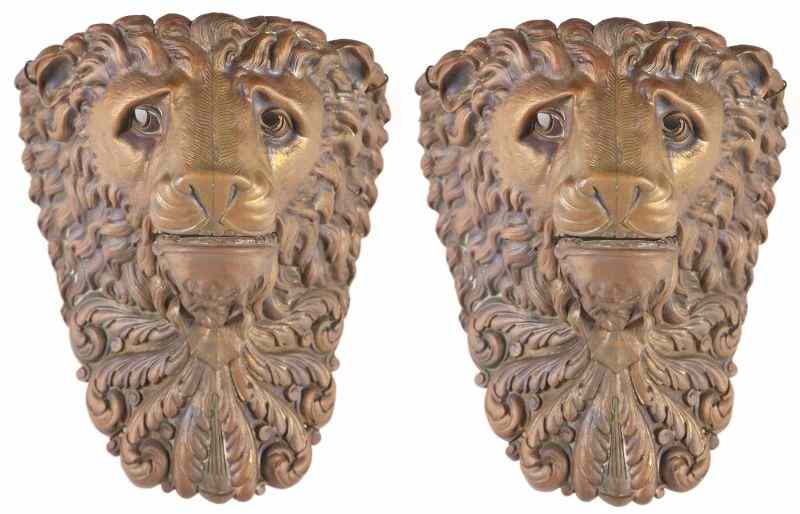 Appraisal: Pair of Italian Brass Lion Garniturescirca articulated jaws garnitures are