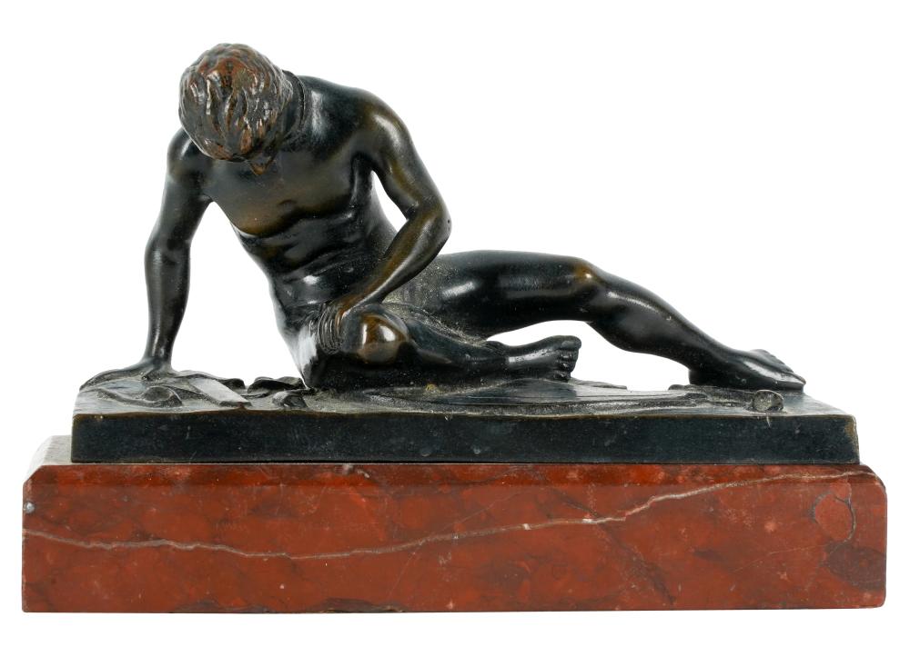 Appraisal: GERMAN BRONZE FIGURE OF RECLINING MANmounted to a marble base