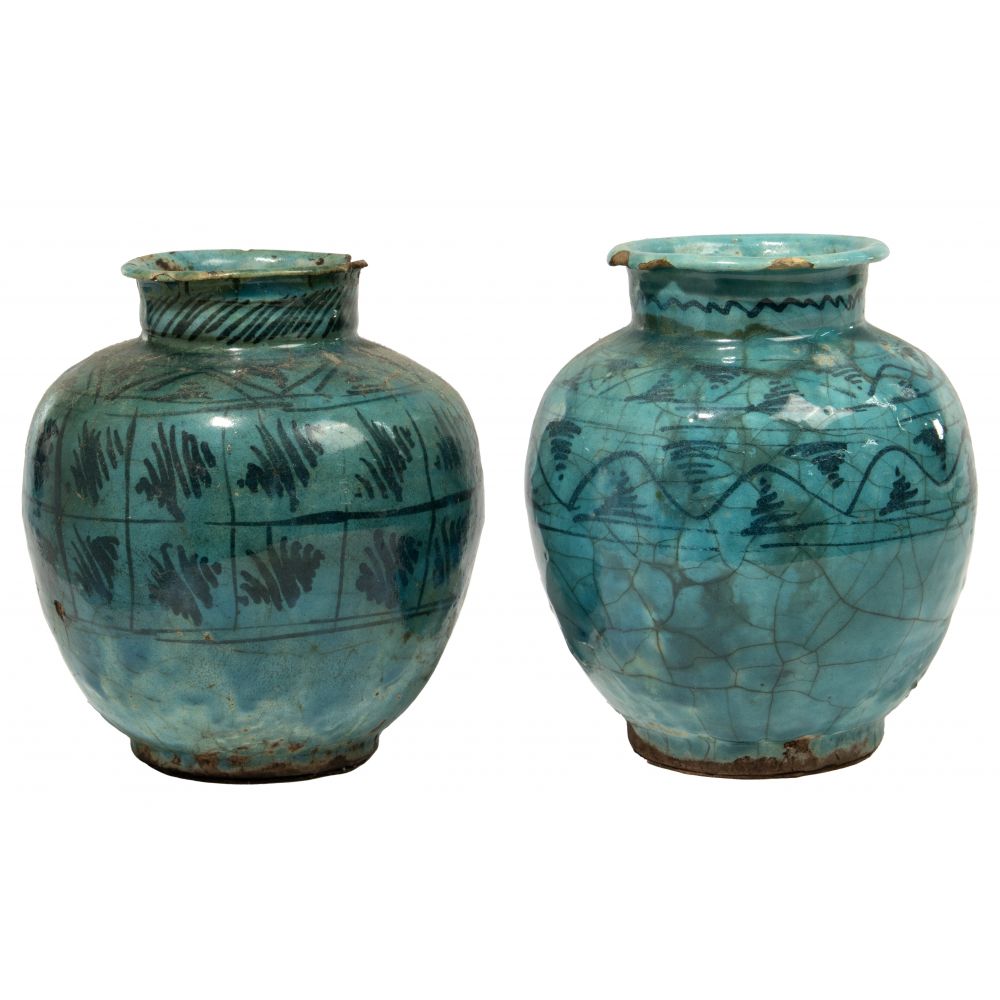 Appraisal: ISLAMIC KASHAN WARE POTTERY VASES both with turquoise glaze and